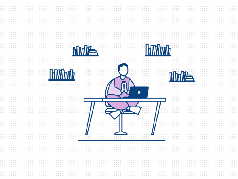 Vector graphic of a person sitting cross legged at a computer desk